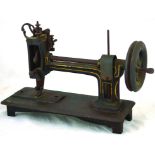 FRENCH SEWING MACHINE. 10ins tall, cast iron base black with traces of gold decoration, hand