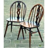 PAIR OF WOODEN DINING CHAIRS. 32ins tall, wooden dining chairs with bowed backs, Ercol style (?) (2)
