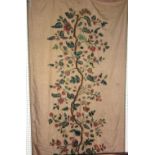 A large 19th century crewel work tapestry depicting leaves and flowers.