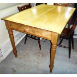 A 19th century pine rectangular dining table.