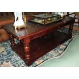 An oak rectangular two tier coffee table.