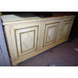 A cream painted rectangular sideboard.