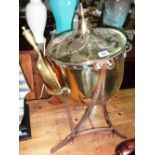 A 19th century brass and steel coal bucket on stand.