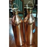 A pair of copper and brass flasks with screw caps, initialled W.D, dated 1914, World War I style.