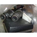 A quantity of binoculars and opera glasses and a Rollei light meter, (qty).