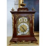 A mahogany cased triple train mantel clock, late 19th/early 20th century,