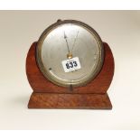 A brass cased table aneroid barometer, presentation engraved to the rear and dated 1862,