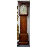 An early 19th century oak and mahogany banded eight day longcase clock,