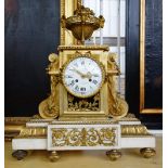 A late Louis XVI style ormolu and white marble mantel clock, circa 1790,