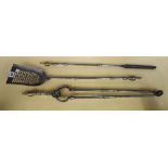 A set of three early Victorian steel and brass mounted fire tools, the shovel 69cm (3).