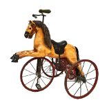 A reproduction horse tricycle (velocipede),