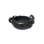 A Chinese bronze censer, 18th century, the compressed circular body applied with two chilong,