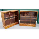 A pair of made up early 19th century satinwood glazed bookcases on plinth bases, each 96cm wide.