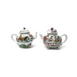 A pair of Chinese famille-rose globular teapots and covers, Yongzheng,