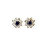 A pair of sapphire and diamond set nine stone cluster earstuds,