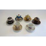 Six European porcelain cups and trembleuse saucers, late 18th century to late 19th century.