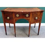 A George III mahogany bowfront side table, with three frieze drawers, on tapering square supports,