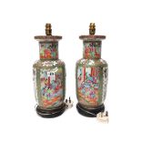 A pair of Canton famille-rose baluster vases, 19th century,