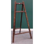 A large early 20th century stained beech 'A' frame artist's easel, 95cm wide x 178cm high.