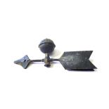 A copper weathervane, 19th century, with spherical surmount and arrow bar, 49cm wide.