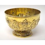 A Victorian silver-gilt rose bowl, with embossed floral and fluted decoration, London 1895,