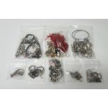 Silver and other jewellery, comprising; a charm bracelet,