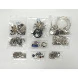 Mostly silver jewellery, comprising; six rings, four brooches, fourteen pendants and charms,