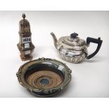 A silver teapot, of squat oval form, with partly fluted decoration,