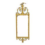 A 19th century French gilt framed wall mirror with floral urn mounted crest above the two part