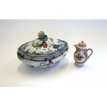 A Faenza (Ferniani) faience shaped oval two-handled tureen and cover, early 19th century,