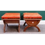 A pair of early 20th century French square lift top stools on 'X' frame supports, 47cm wide.