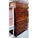 A Regency mahogany chest on chest, with two short over six long graduated drawers,