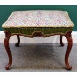 A late 19th century mahogany framed square footstool, with shell carved frieze on cabriole supports,