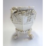 A Belleek porcelain jardiniere, black painted mark,