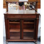 In the manner of George Oakley; a Regency brass mounted rosewood chiffonier,