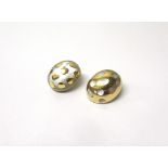 Two gold and mother of pearl earclips,