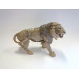 A Bing and Grondahl large model of a roaring lion, no.2052, circa 1950, 23.5cm high.