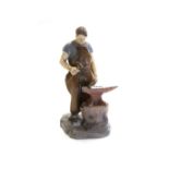 A Bing and Grondahl porcelain figure, no.2225, modelled as a blacksmith, 28.5cm high.