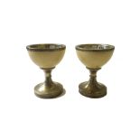 A pair of Anthony Redmile Ostrich egg and silvered brass goblets, late 20th century,