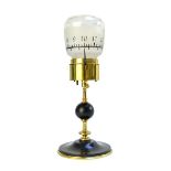 A French gilt and patinated brass table clock of candlestick form, early 20th century,