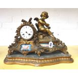 A French gilt spelter and porcelain inset figural mantel clock, late 19th century,