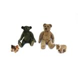 A Steiff style green teddy bear, with boot button eyes and jointed limbs, 33cm,