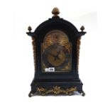 An ebonised and gilt metal mounted mantel clock, late 19th century,