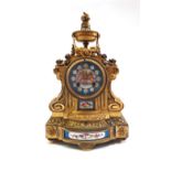 A French gilt bronze and porcelain clock, circa 1880,