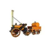 A Hornby 'Stephenson's Rocket' live steam engine and tender, with yellow livery, 40cm wide.