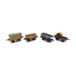 A Hornby pre-war O gauge tinplate clockwork train set, boxed, and a quantity of wagons,