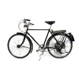 A 1953 gentleman's Raleigh bicycle fitted with a 35cc BSA winged wheel engine, black,