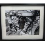 A framed black and white photograph of a Norton 16H, together with another of a Triton.