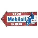 A 20th century 'Mobiloil' tin advertising sign in the form of a left facing arrow,