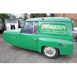 A 1956 Reliant Regal van, green, 757cc. Registration: YYC 947.